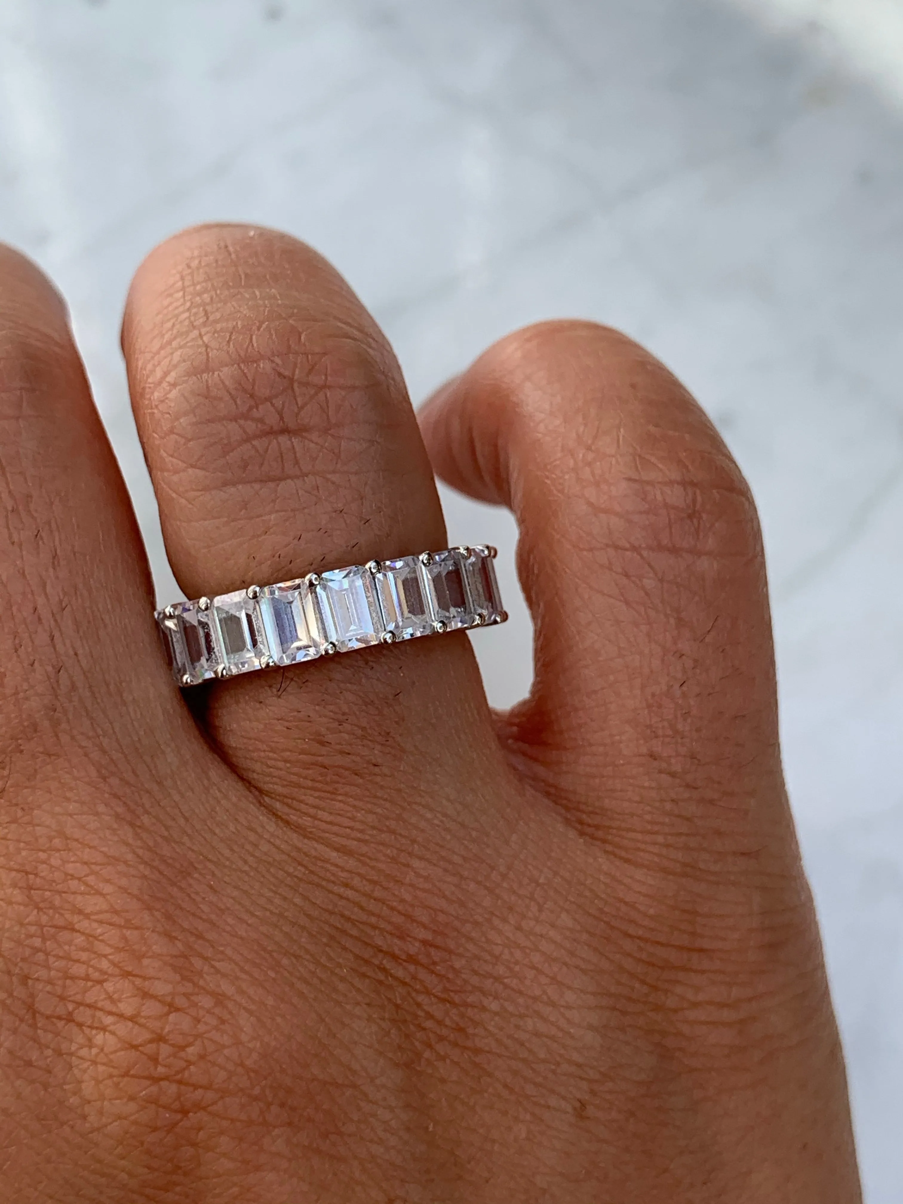 Sterling silver emerald cut eternity band